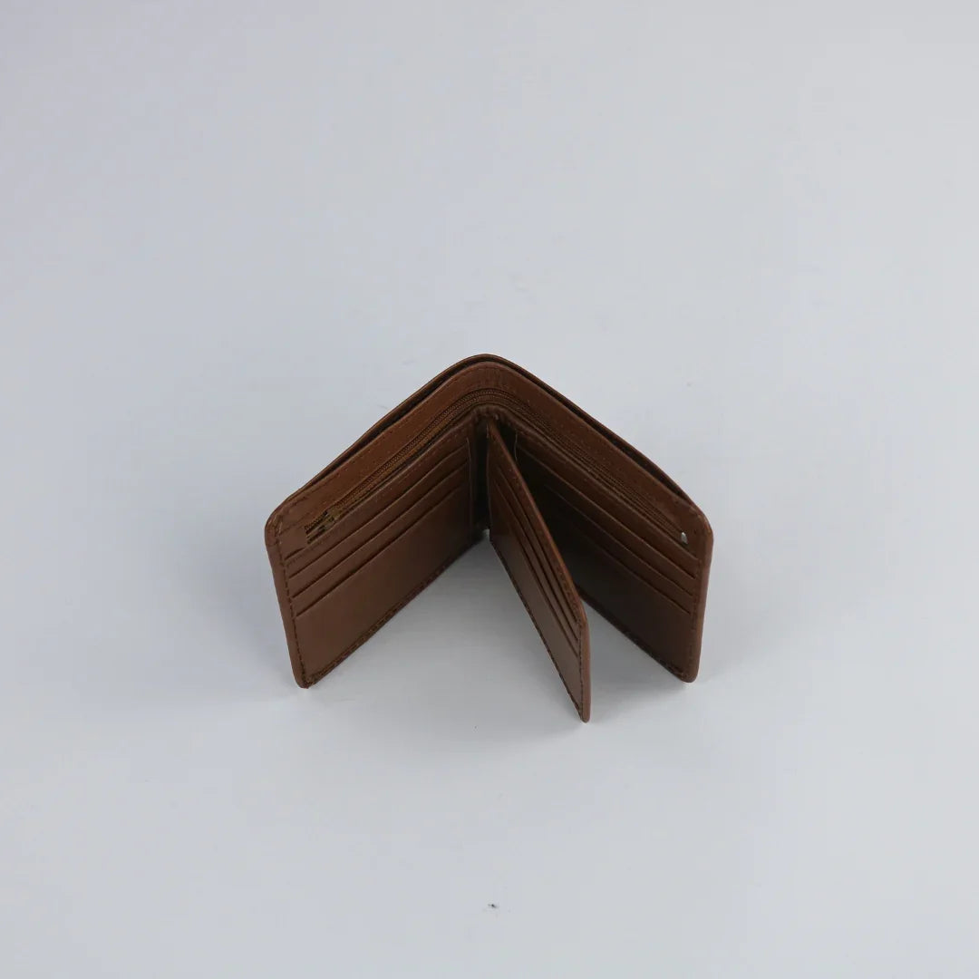 Brown leather wallet on a light gray background