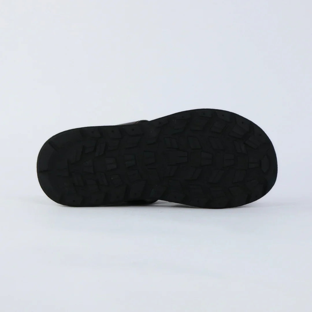 Black sole of a shoe on a light gray background