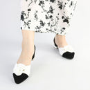 Noir Petal Pumps