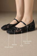 Embroidered Black Pumps