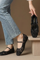 Embroidered Black Pumps