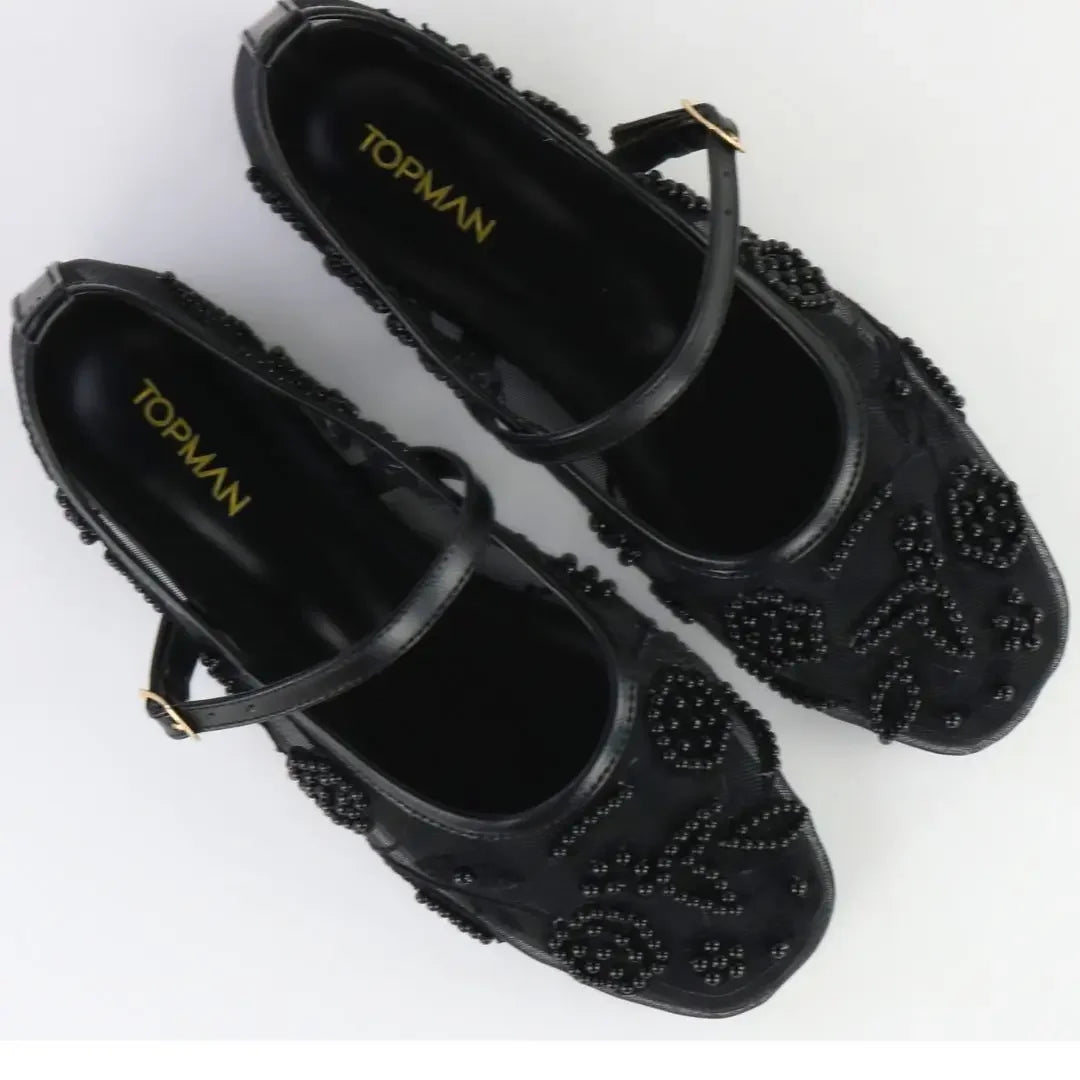 Embroidered Black Pumps