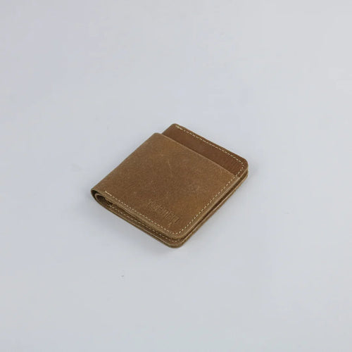 Brown leather wallet on a light gray background