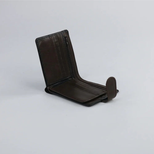 Brown leather wallet on a light gray background