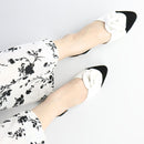 Noir Petal Pumps