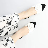 Noir Petal Pumps